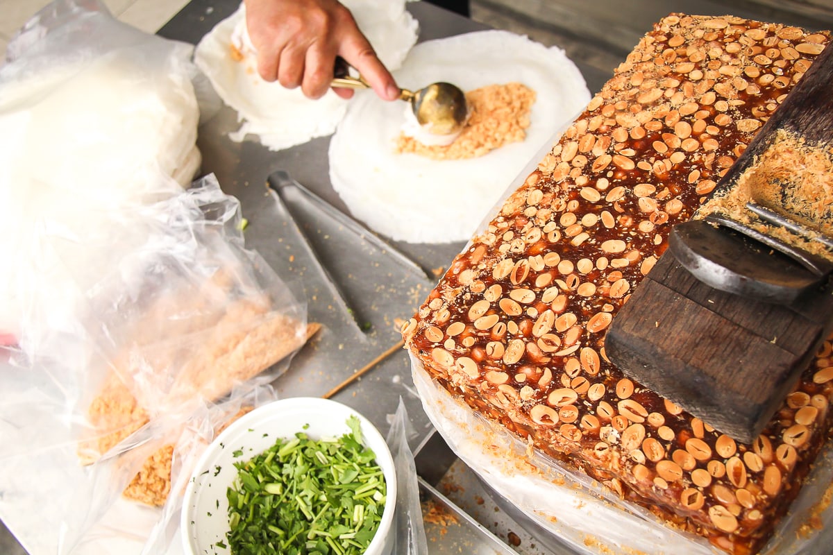 table with peanut brittle block and ice cream wrap