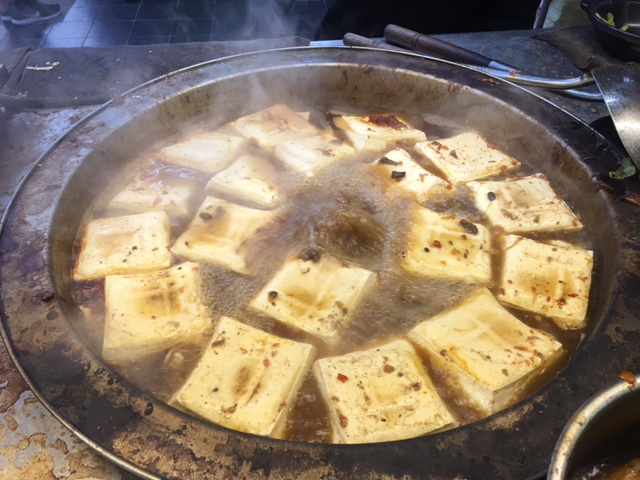 large steaming pot of tofu